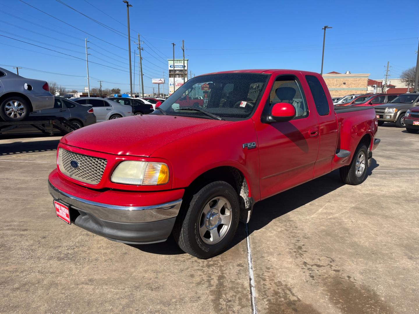 2003 red /TAN Ford F-150 XL SuperCab Flareside 2WD (1FTRX07213K) with an 4.2L V6 OHV 12V engine, Automatic transmission, located at 14700 Tomball Parkway 249, Houston, TX, 77086, (281) 444-2200, 29.928619, -95.504074 - Photo#2